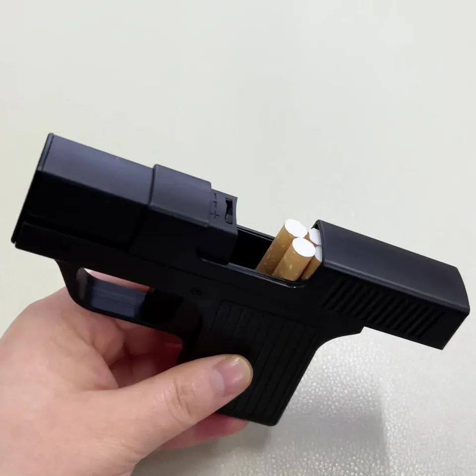 Encendedor en Forma de Pistola con Guarda Cigarrillos